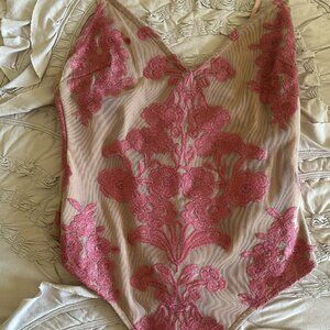 Medium bodysuit with pink stitching